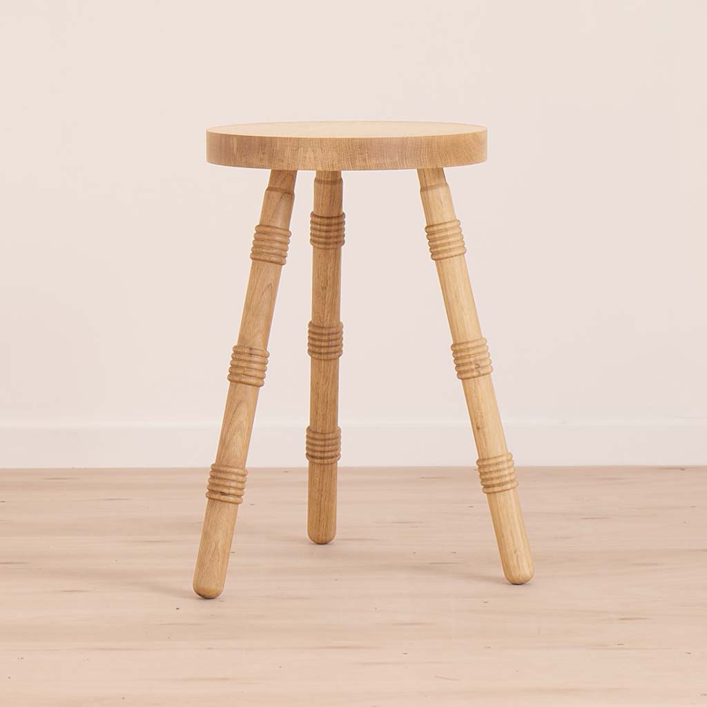 A handmade stool crafted from solid ash
